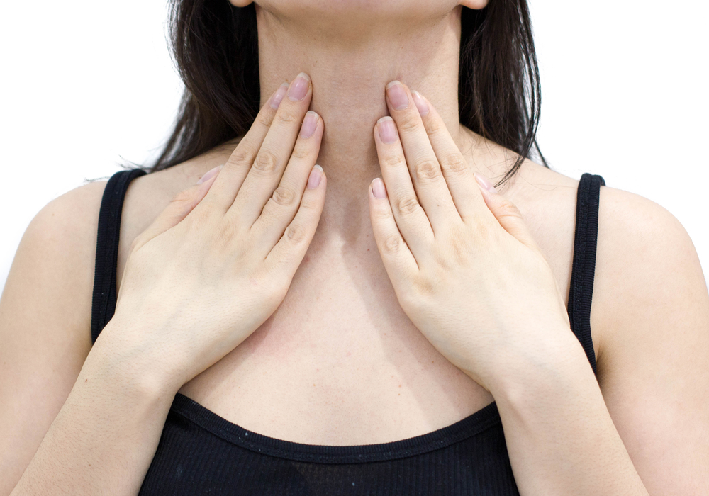 a woman with a goitre and an underactive thyroid gland