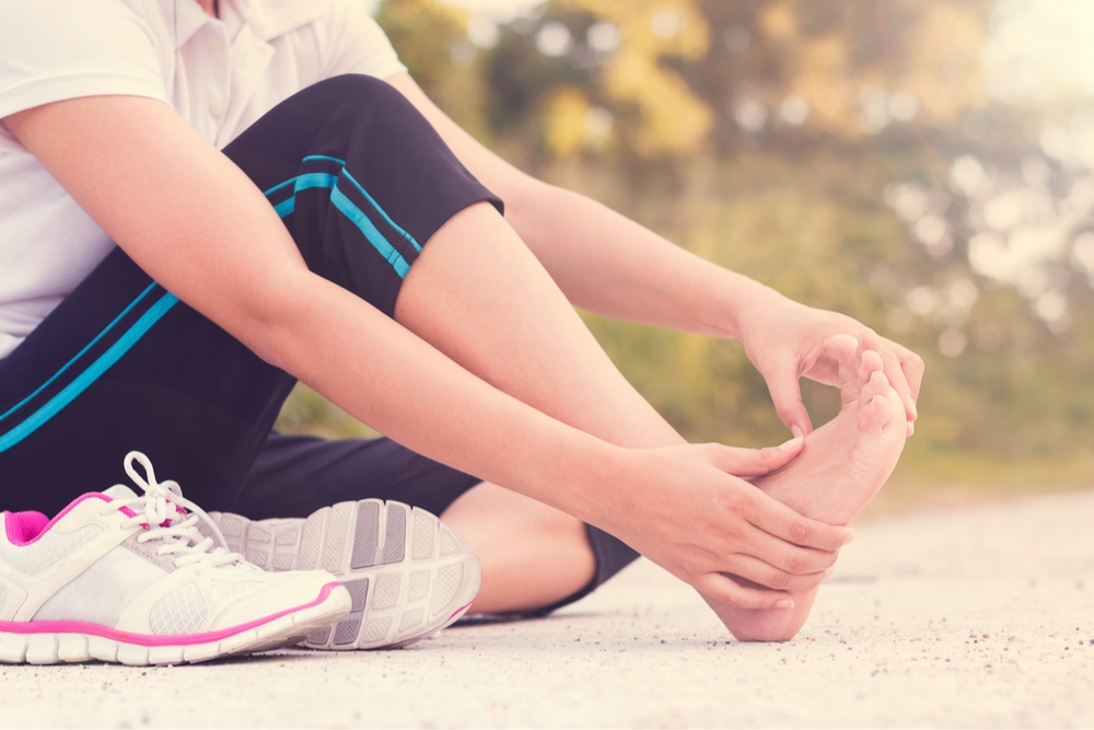 a runner with foot pain, what is plantar fasciitis?
